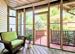 Lower level screen porch is a great place to relax 